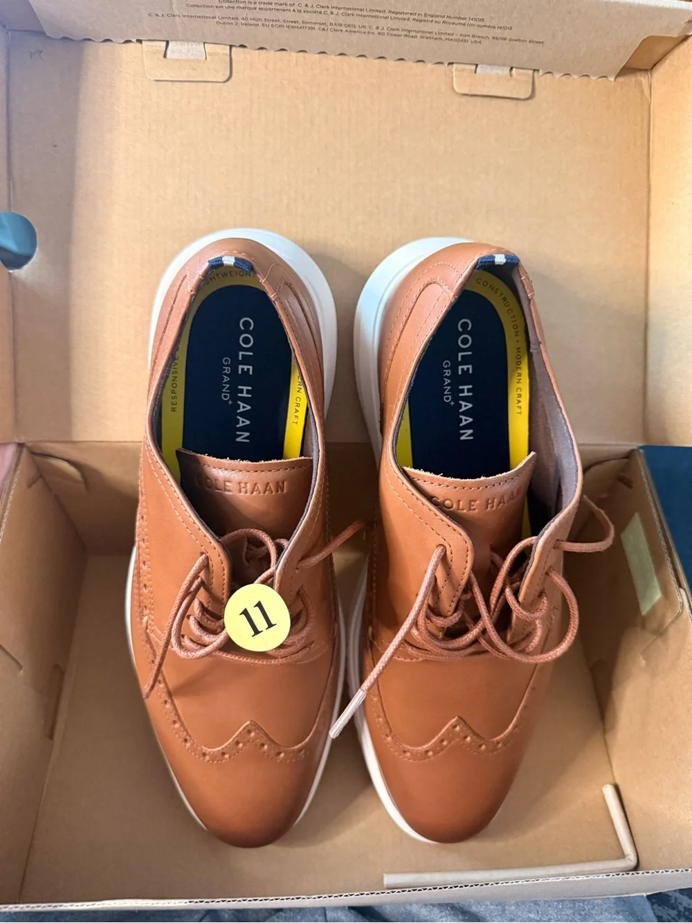 Cole Haan Tan Leather Wingtip Derbys with White Soles
